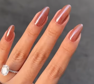 Hailey Bieber's 'glazed donut' nails get an autumnal upgrade