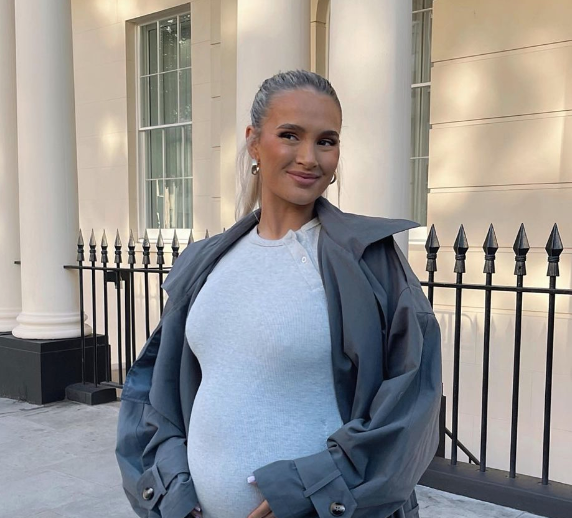 Pregnant Molly-Mae Hague changes outfits while in Manchester for a